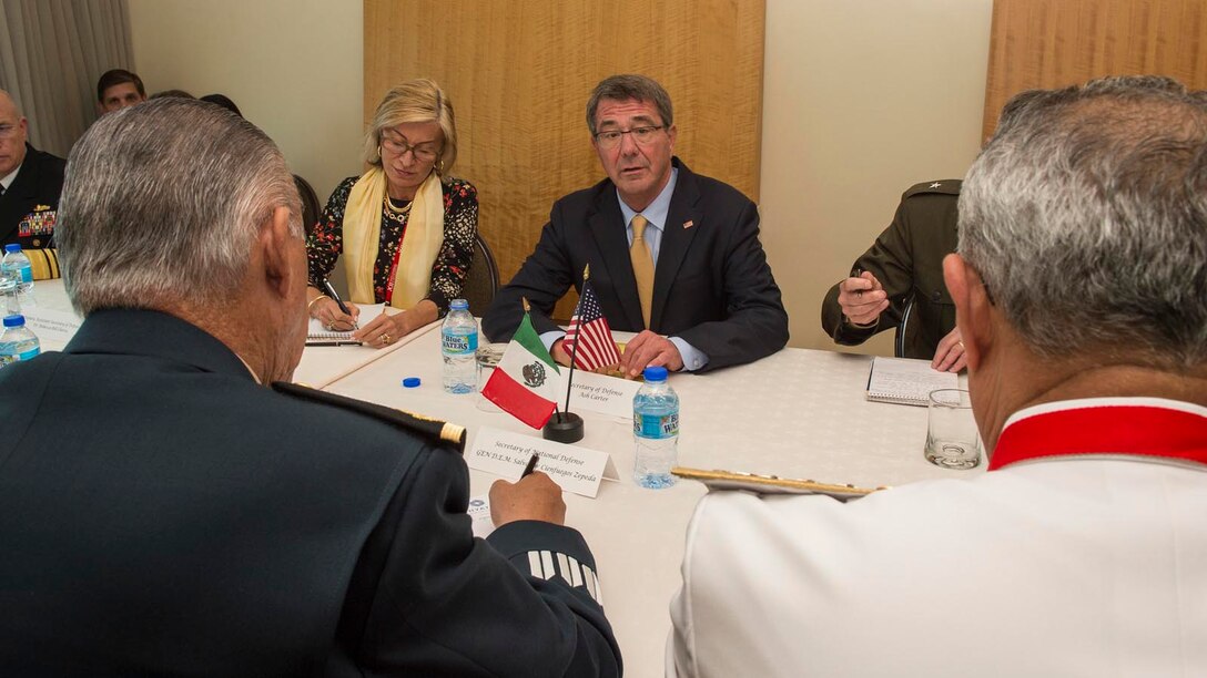 Defense Secretary Ash Carter meets with Mexican Defense Secretary Gen. Salvador Cienfuegos Zepeda on the sidelines of the Conference of Defense Ministers of the Americas in Port-of-Spain, Trinidad and Tobago, Oct. 11, 2016. DoD photo by Air Force Tech. Sgt. Brigitte N. Brantley