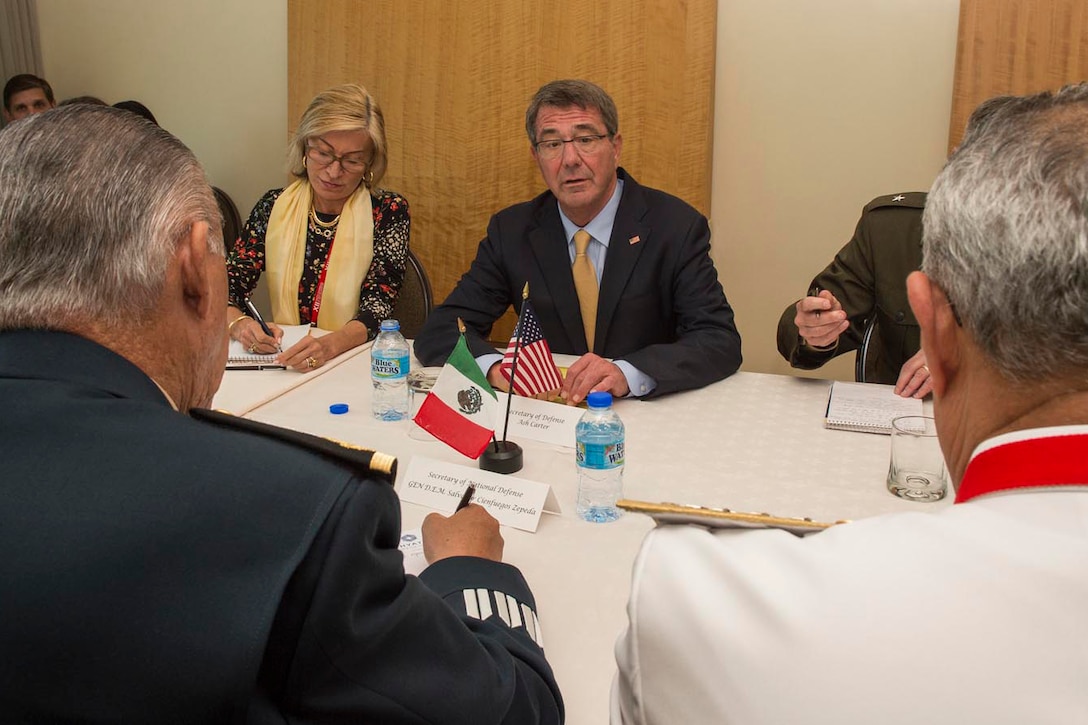 Defense Secretary Ash Carter meets with Mexican Defense Secretary Gen. Salvador Cienfuegos Zepeda on the sidelines of the Conference of Defense Ministers of the Americas in Port-of-Spain, Trinidad and Tobago, Oct. 11, 2016. DoD photo by Air Force Tech. Sgt. Brigitte N. Brantley 