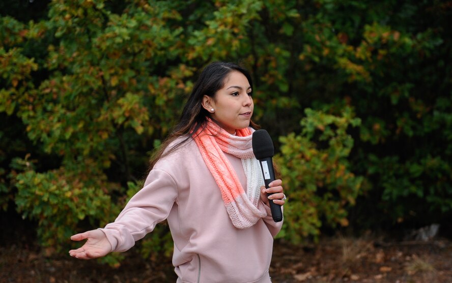Senior Airman Rosa Arreola, 86th Logistical Readiness Squadron equipment journeyman, speaks before a breast cancer awareness 5 km run at Ramstein Air Base, Germany, Oct. 8, 2016. The Hispanic Heritage Committee hosted the event, with Arreola as the main coordinator. The Hispanic Heritage Committee works with the professional development and community involvement of their members throughout the year. This 5 km event was the fourth event for the month. (U.S. Air Force photo by Airman 1st Class Savannah L. Waters)