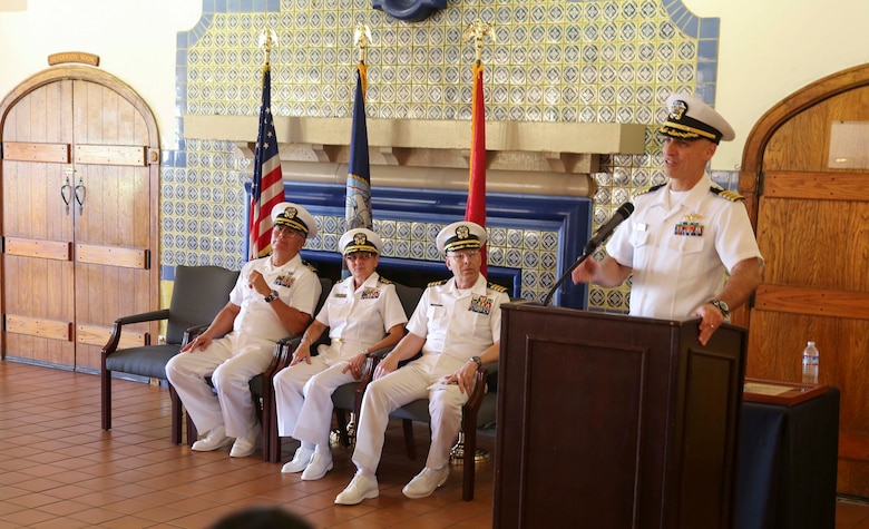 Captain Mark Tucker (R), Naval Medical Center San Diego, speaks at Cmdr. Rafael C. Perez’s (ret.), division officer, Sports and Medicine Rehabilitation Center, retirement ceremony at the Bay View Restaurant at MCRD San Diego, Oct. 7. Perez served for 44 years and three months in the U.S. Navy, and he was deployed several times.