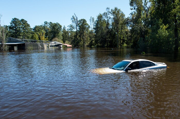 If you approach a flooded roadway, do not drive through those waters or around barricades that are blocking the flooded road. Check out additional tips and information about flooding today.  (U.S. Air National Guard photo by Tech. Sgt. Jorge Intriago)