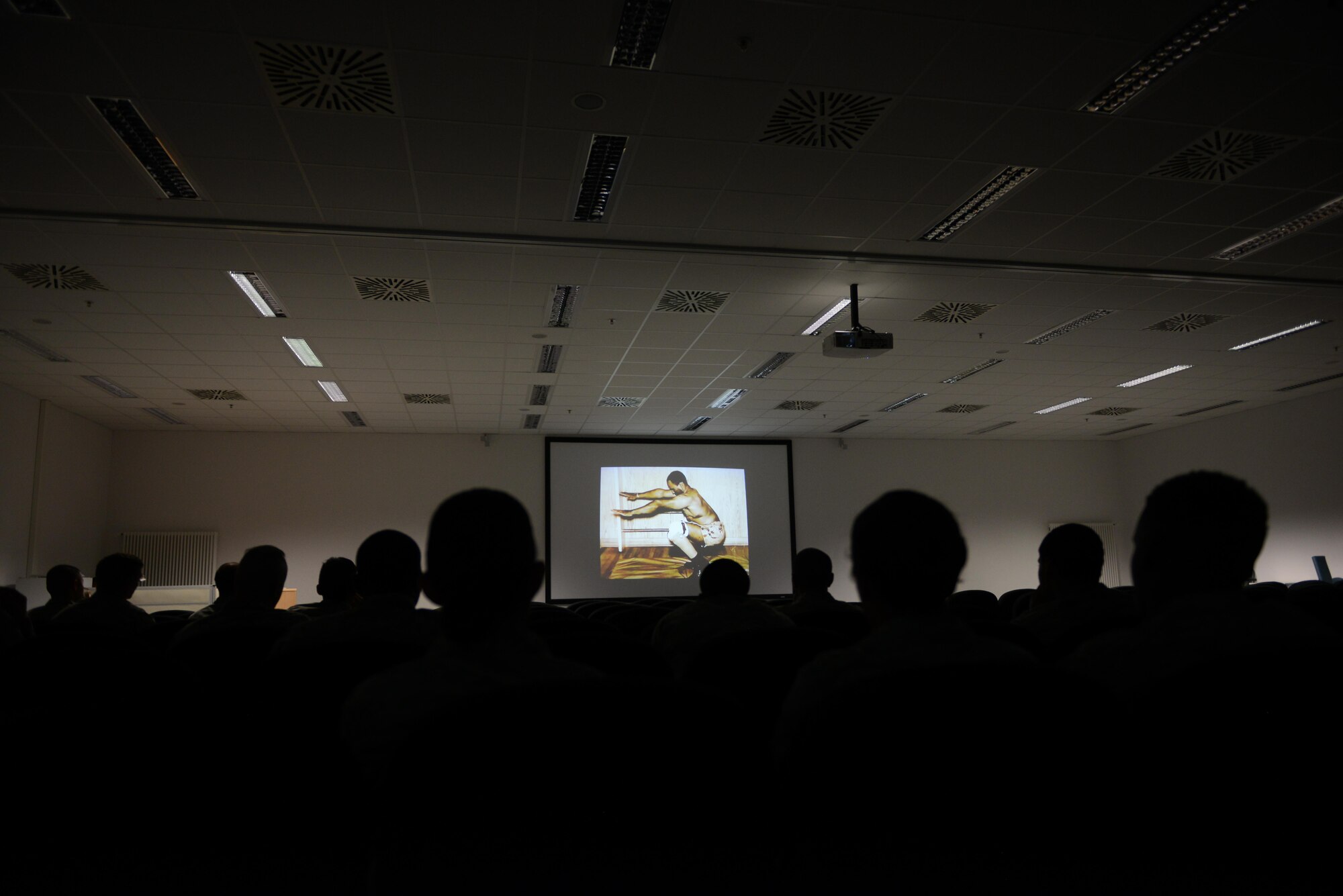 Ramstein Airmen watch a video during an educational dialogue called a lunch and learn for National Disability Employment Awareness Month at Ramstein Air Base, Germany, Oct. 7, 2016. NDEAM aims to highlight the need to advocate for people with disabilities looking for employment. (U.S. Air Force photo by Airman 1st Class Joshua Magbanua)