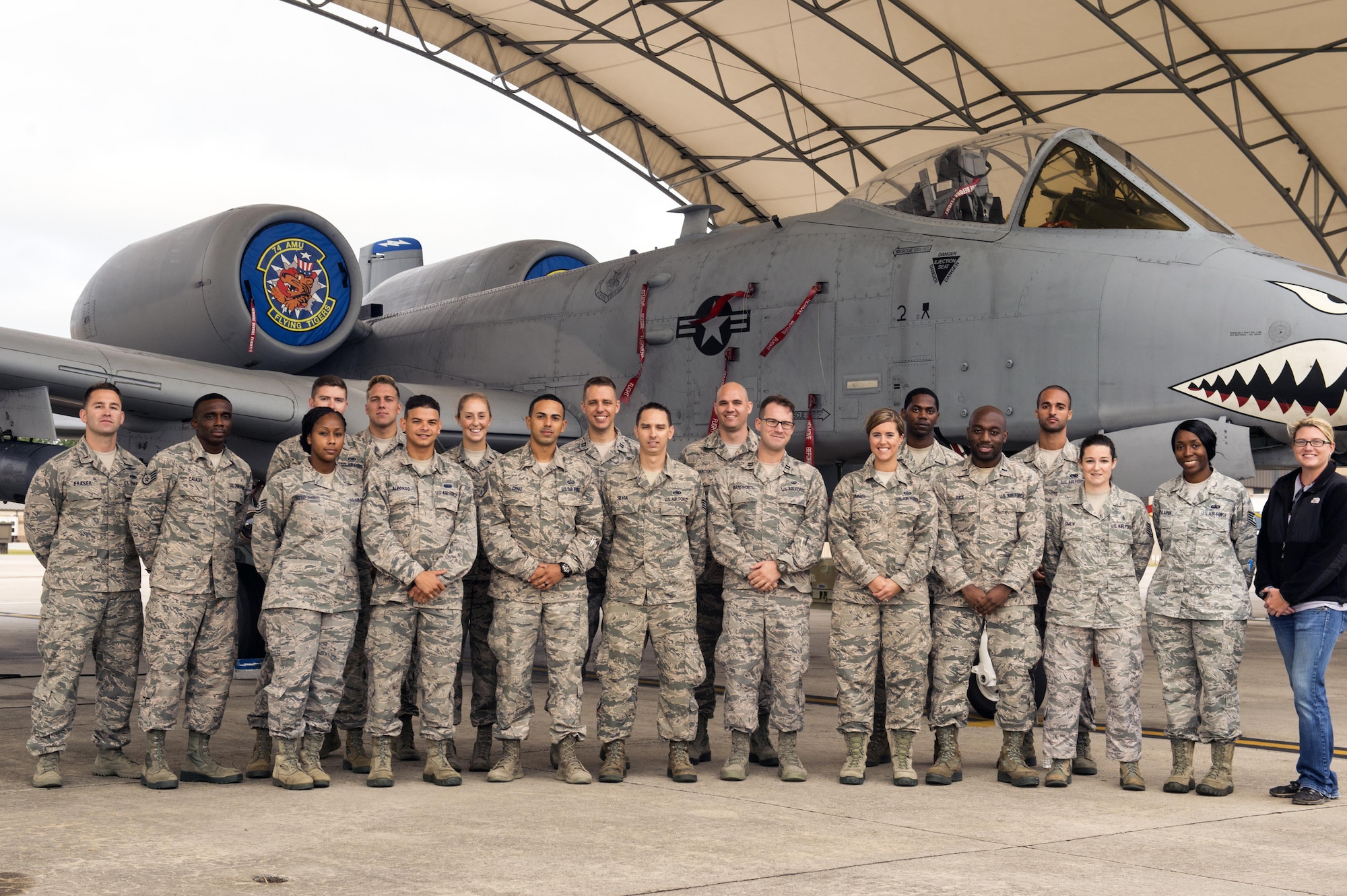 Airmen from the first iteration of the Emerge Moody program pose beside an A-10C Thunderbolt II, Oct. 6, 2016, at Moody Air Force Base, Ga. These Airmen from various career fields began a nine-month course designed to better understand Moody’s mission. They will learn about the combat rescue, base defense, close-air-support, law enforcement and mission support missions on base. (U.S. Air Force photo by Airman 1st Class Greg Nash)