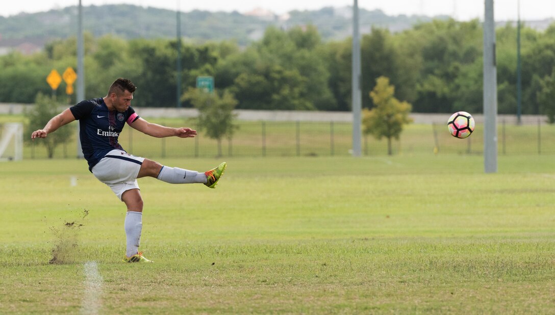 U.S. Air Force Staff Sgt. Nelson Hernandez, 317th Aircraft Maintenance Squadron avionics technician, kicks a soccer ball at the South Texas Area Regional Soccer Complex in San Antonio, Texas, Sept. 5, 2016. During the Defender’s National Military Soccer Tournament, the Dyess Varsity soccer team played a total of eight games against 45 other teams from various branches of service. (Courtesy photo by Patricia Moreno)