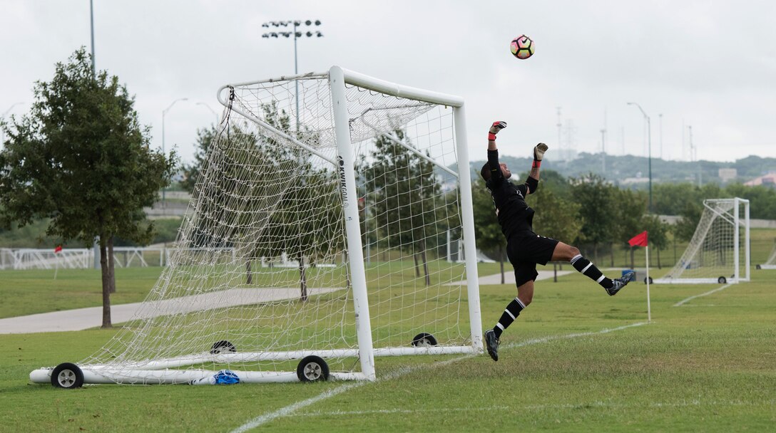 U.S. Air Force Senior Airman Bruno Falcone, 7th Aerospace Medicine Squadron dental assistant, blocks a goal at South Texas Area Regional Soccer Complex in San Antonio, Texas, Sept. 5, 2016. The Dyess Varsity soccer team ended the Defender’s National Military Soccer Tournament 2nd out of the 38 participating Air Force teams, and 4th out of all 46 Department of Defense teams. (Courtesy photo by Patricia Moreno)