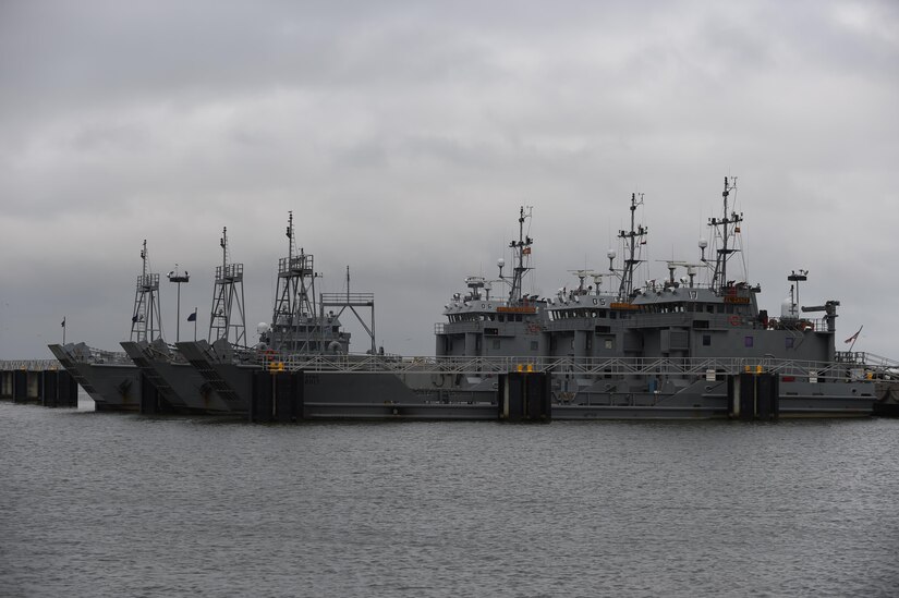 7th Transportation Brigade (Expeditionary) Soldiers prepare U.S. Army vessels for departure from Third Port at Joint Base Langley-Eustis, Va., Oct. 7, 2016. While some vessels were departed, others were latched to hurricane buoys within the harbor. (U.S. Air Force photo by Staff Sgt. Natasha Stannard)