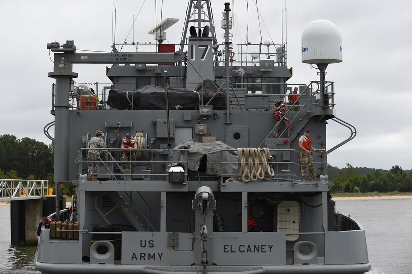 7th Transportation Brigade (Expeditionary) Soldiers evacuate the El Caney, a Landing Craft Utility Vessel, at Joint Base Langley-Eustis, Va., Oct. 6, 2016. The vessel, along with several others were evacuated as a precautionary measure in preparation for Hurricane Matthew. (U.S. Air Force photo by Staff Sgt. Natasha Stannard)