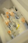 Influenza vaccinations lay in a bin on Laughlin Air Force Base, Texas, Oct. 4, 2016. Influenza, the flu, is a world-wide contagious disease that spreads throughout the U.S. every winter, with peak season between October and May. (U.S. Air Force photo/Senior Airman Ariel D. Partlow)