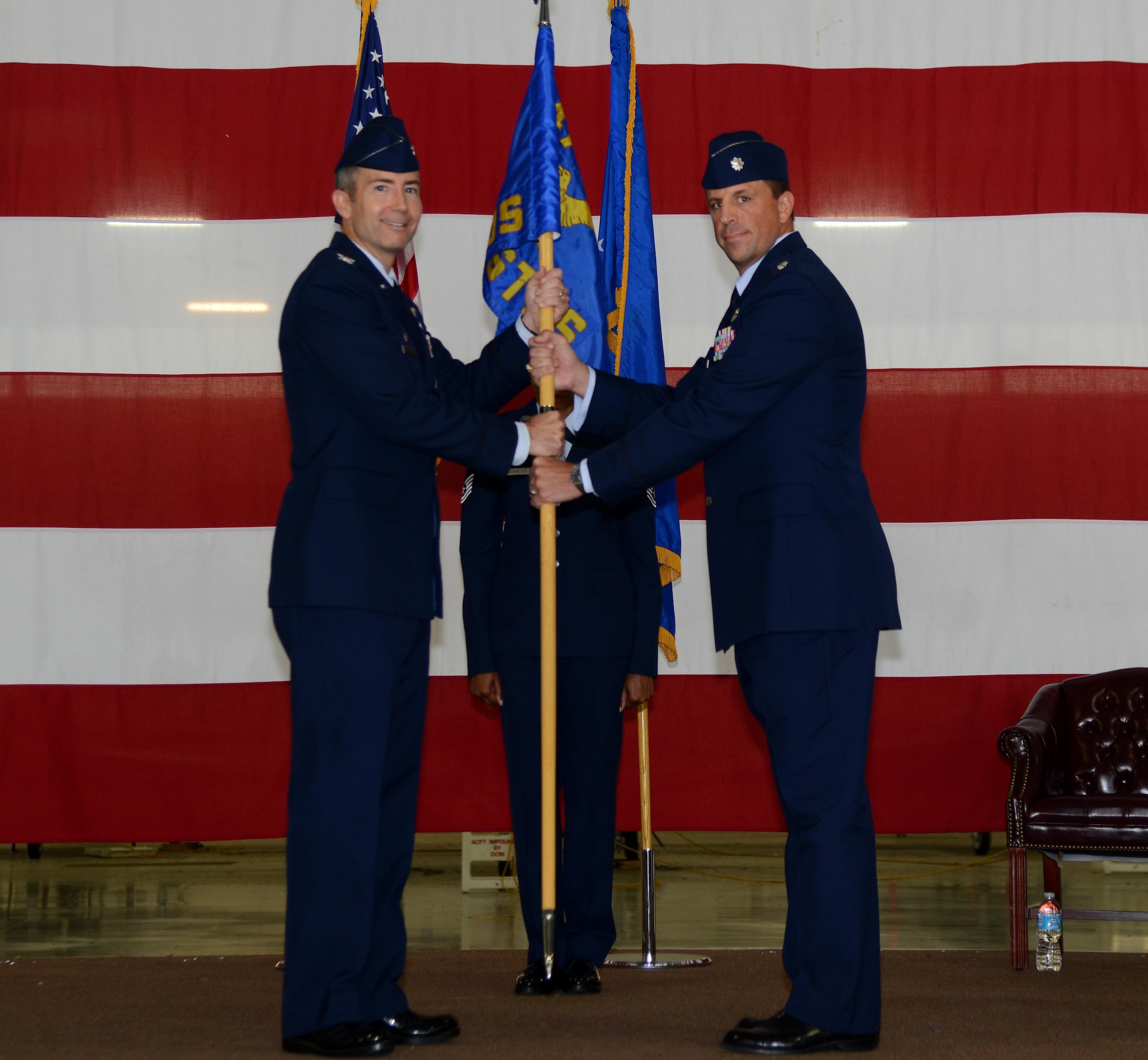 Lt. Col. Cory Christoffer, right, 47th Student Squadron commander, poses for a photo with Col. Bryan Runkle, 47th Operations Group commander, during a change of command at Laughlin Air Force Base, Texas, Oct. 7, 2016. Christoffer came to the 47th STUS from his previous position as the chief of safety, 47th Flying Training Wing, at Laughlin. (U.S. Air Force photo/Senior Airman Ariel D. Partlow)