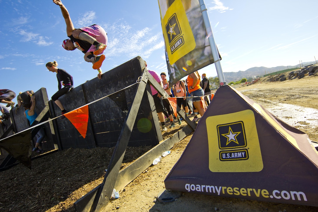 LAKE ELSINORE- Calif. (October 8, 2016) - The Army Reserve is a sponsor for the Southern California Tough Mudder, where participants run a basic-training like course over ten miles long with 22 different team obstacles. “Tough Mudder is a great recruiting and retention event because it is an opportunity for civilians to interact with Soldiers and see that the Army is here to support local communities in both good times and bad,” said Master Sgt. Shadonika Crawford, 650th Regional Support Group. 

(US Army photo by Cpl. Timothy Yao)