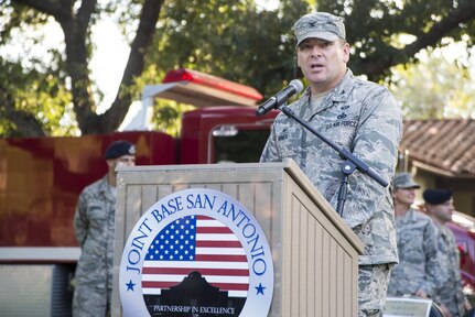 Col. Thomas Miner, 502nd Security Forces and Logistics Support Group commander, gives opening remarks to kick off the 33rd annual National Night Out at Joint Base San Antonio-Randolph Oct. 4, 2016. NNO is a crime, drug and violence prevention event sponsored by the National Association of Town Watch. 