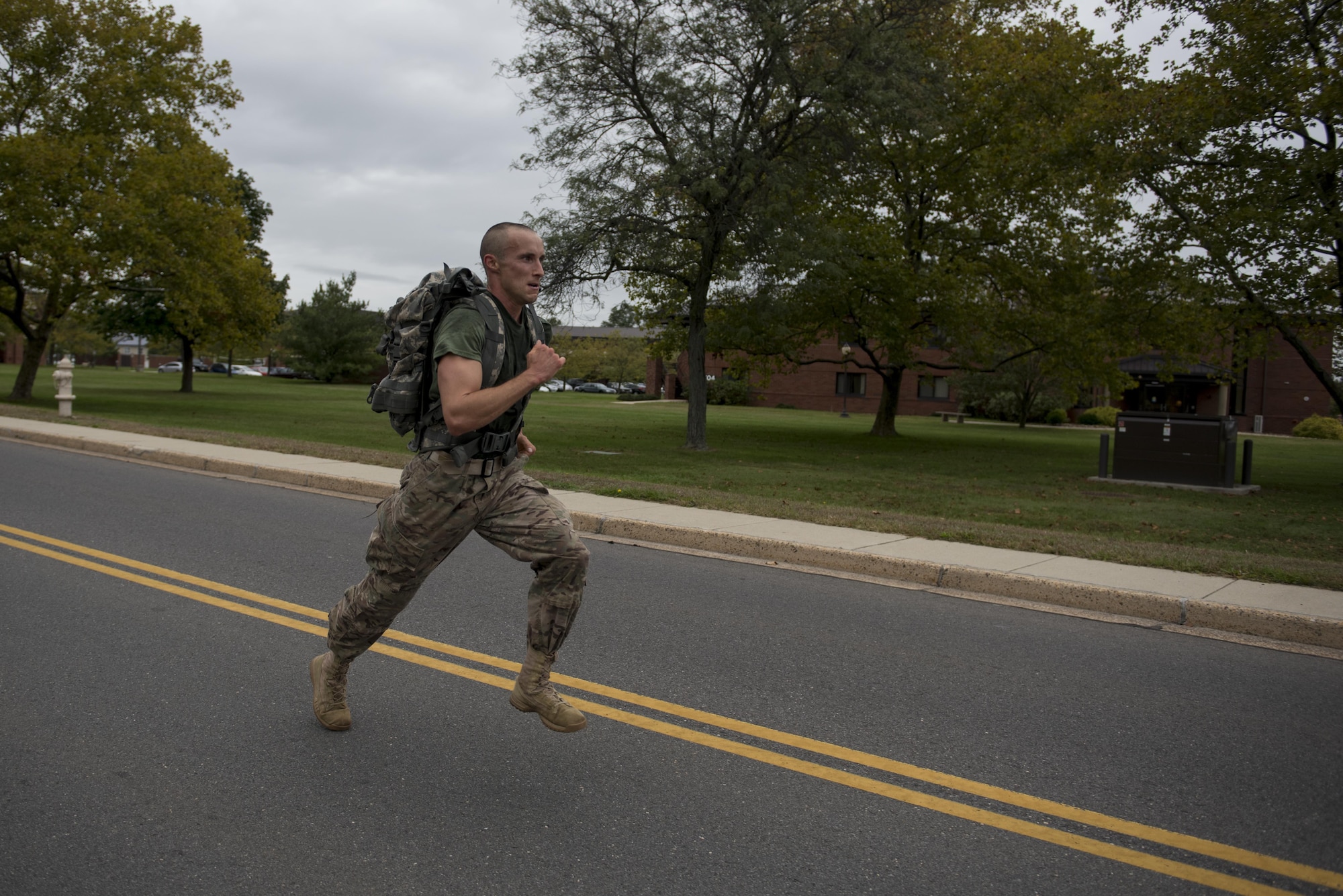 U.S. Army Sgt. Joseph Karslo, Army Public Health Command veterinarian, sprints to victory at the annual Gold Star Ruck March on Joint Base McGuire-Dix-Lakehurst, N.J., Oct. 8, 2016. Karslo finished first at the 10k ruck march. His time was just under an hour.