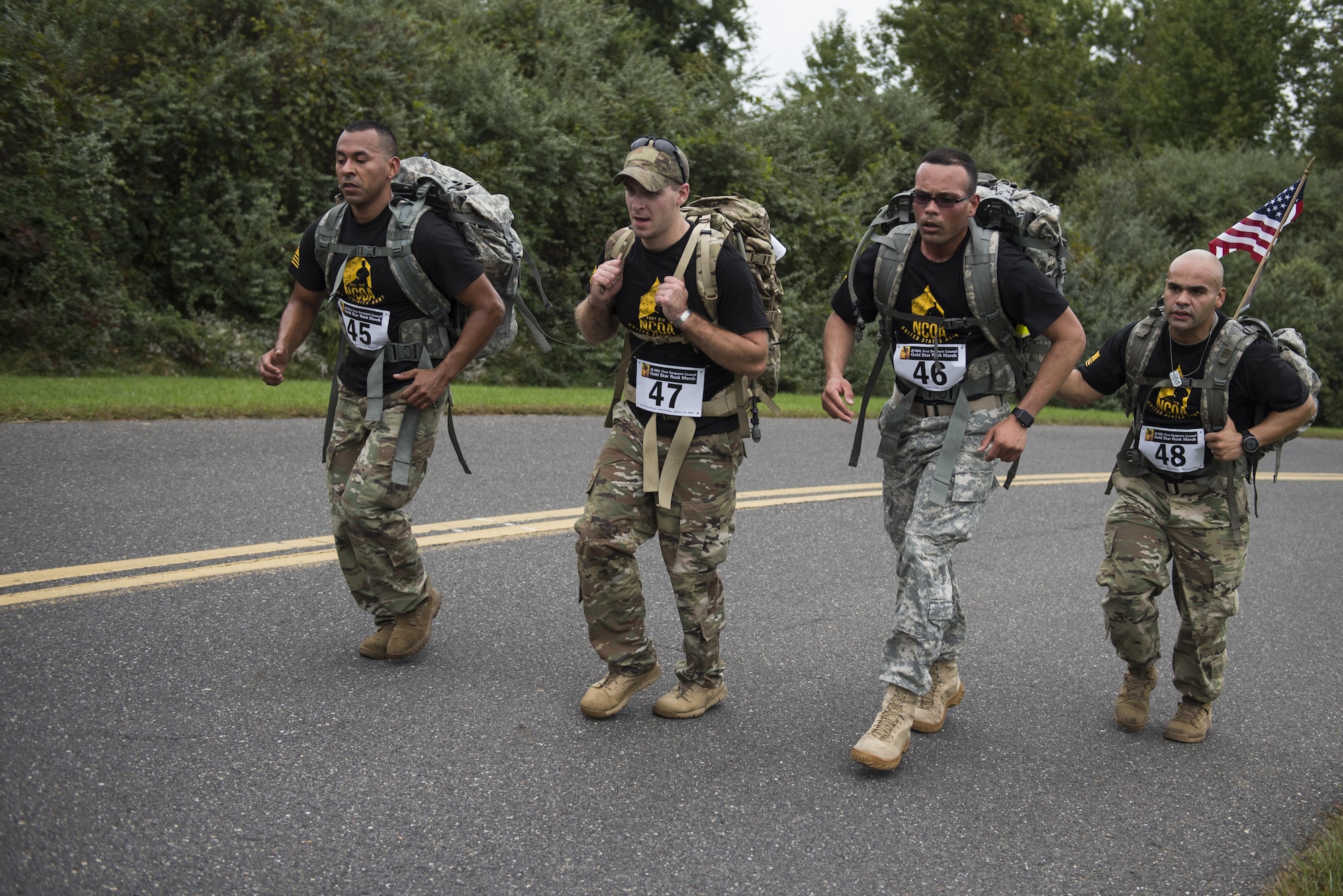 The Army NCO Academy Alpha Team ruck marches at the annual Gold Star Ruck March on Joint Base McGuire-Dix-Lakehurst, N.J., Oct. 2016. Teams from across the Joint Base attended the event to honor and represent the 28 Gold Star Families in attendance. 