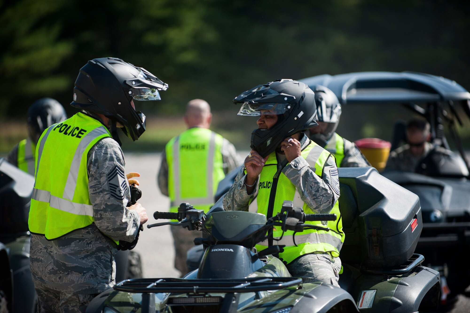 Air Mobility Command Command Chief Master Sgt. Shelina Frey arrives by all-terrain vehicle to the shoot house while visiting the 375th Security Forces Squadron. She visited the 375th Air Mobility Wing to familiarize herself with the mission. (U.S. Air Force Photo/Staff Sgt. Clayton Lenhardt)