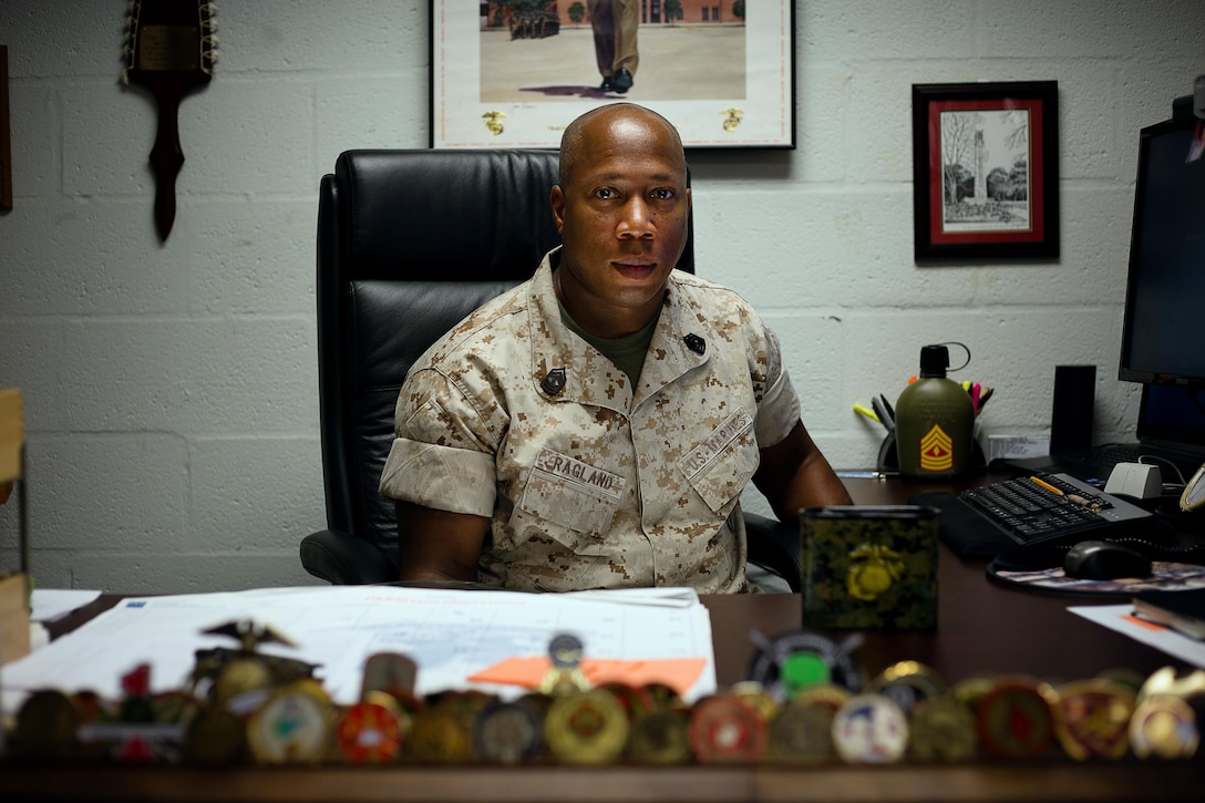 First Sgt. Jonathan James Ragland, 43 — Manhattan, New York
I was a platoon sergeant at Quantico. I was working on some pistols at the time when I heard over the radio that 9/11 happened. 
I called my wife, she called the school to make sure the kids were OK, because at the time it sounded like we were under a world attack and not just the Towers. My wife left work at Little Hall, picked the kids up and made sure they were safe at home.
Myself and a couple other Marines wanted to try to get together and drive over to see if there was anything we could do to help but we were told to stand down and stay on base and make sure we were accounted for.
As the situation went on, it seemed to get a lot worse. I tried to make my way to the Pentagon but they wouldn’t let us in to the city.
My initial reaction was “this is unreal, where can I go to help, and who needs payback for what’s just happened.” I have family members in New York, and I wanted to make sure they were ok.
It was a lot of anger, a lot of disappointment that something like that could happen.
We talked to our kids about what happened. My son joined the Marines because he wants to do his part. My daughter is in college, and going to join the Air Force because she wants to do her part, so that we can defend our nation. That was what they grew up on, that there’s a purpose why we’re here and why we do what we do as military members.
At the time, I was already prepared to go to the drill field. I was going to help prepare young men to be Marines so they could go out and do the job with me. Fifteen years have passed and it’s not going to ever go unremembered. It’s always in my prayers that it doesn’t happen again, and that we all stay safe, and we all come home."