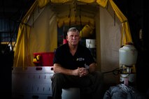 Master Sgt. (Ret) Patrick Glenn Higgins, 53 — San Diego, California
I was driving down I-15 towards Marine Air Station Miramar when I received a phone call from my wife about what happened. I asked her, “What’s the weather like, Ramona?” She told me it was a clear day, and that’s when I knew it was a terrorist attack.
I’d just left CBIRF [the Marine Corps Chemical Biological Incident Response Force] a month prior, so she though that it was just my CBIRF paranoia. 
By the time I got to Miramar, the second plane had hit and shortly thereafter, I was on an airframe headed toward Bahrain to evaluate the airfield for strikes on Afghanistan.
I was concerned because several friends of mine are New York City Firefighters. Got on the phone to try and reach them and naturally the cell service was dead. Ray Downey, the man this facility is named after, was one of them.
Ray Downey was an 0311. He joined in the fifties, got out of the Marine Corps after serving his initial tour. The biggest thing about Ray is he took the Marine Corps Ethos that he was taught and took it to the fire department. He was one of the founding fathers of the Urban Search and Rescue program (FEMA). He was no nonsense, knew his job, was an awesome American, a fine Marine, and an exceptional firefighter. He was the type of man who when he walked into a room everybody shut up and listened — like talking to the burning bush.
He was instrumental in helping me and several other individuals here get the technical rescue program at CBIRF off the ground. We were trying to train Marines at this new unit called CBIRF.
Marines go into a building, if the building comes down around them, the civilian populace, firefighters and whatnot are not going to go into a chemically contaminated environment to pull them out, so we want to train Marines to do that.
The facility itself was built in the late fifties, early sixties. I came up here in 2000 and it was abandoned. So we looked into it as a training venue, over