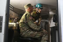 Marine Cpl. Devon Woycke, a team member with Identification and Detection Platoon, Chemical Biological Incident Response Force (CBIRF), shows Army Maj. Gen. Richard Gallant, commander of Joint Task Force Civil Support, the mobile laboratory mechanisms used to identify chemical and biological agents during an official visit at Naval Annex Stump Neck, Md., Sept. 29, 2016. Gallant visited CBIRF’s own training site the Downey Responder Training Facility to learn more about the Marines and sailors with CBIRF, their training and operational capabilities,  and the equipment they use for chemical, biological, radiological, nuclear and high-yield explosive (CBRNE) crisis response and consequence management. (Official U.S. Marine Corps photo by Sgt. Jonathan Herrera/Released)