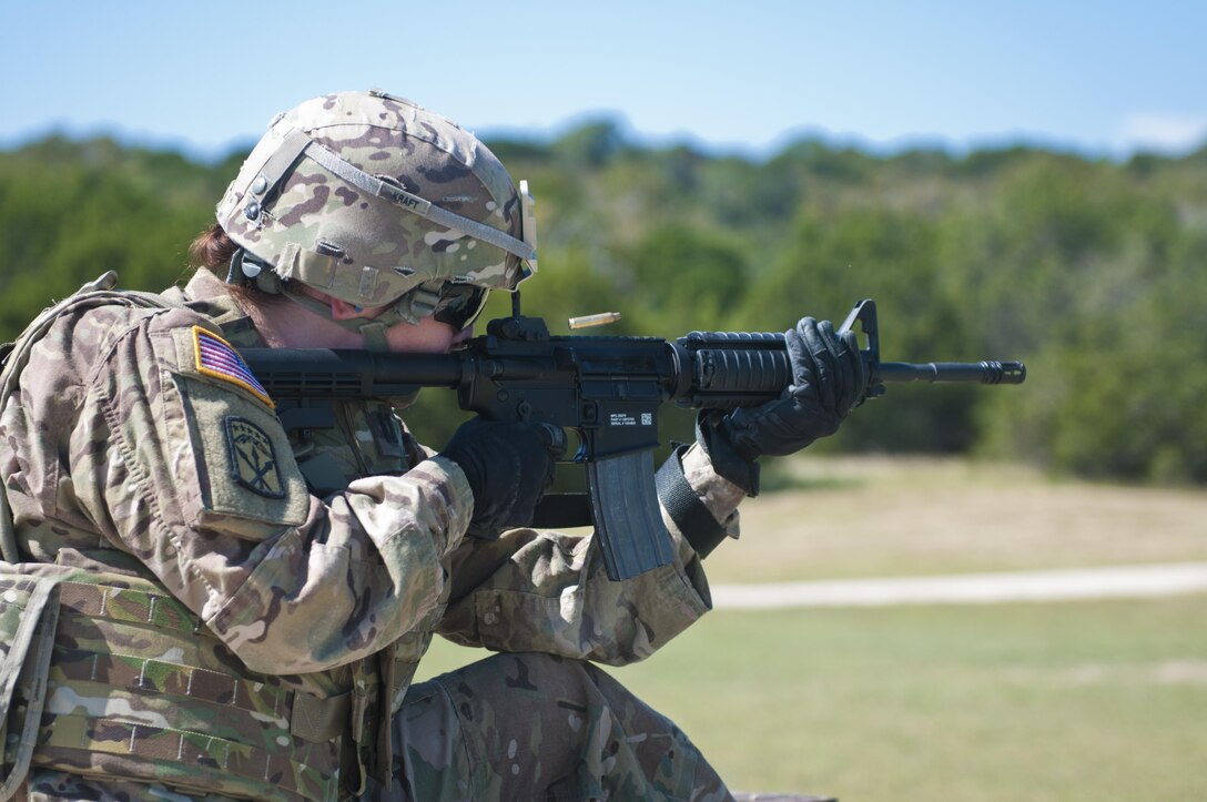 1st Lt. Elizabeth Kraft, an Army Reserve Soldier with the 316th Sustainment Command (Expeditionary), based out of Coraopolis, Pa., shoots her M4 carbine at popup targets during qualification at Fort Hood, Tx., Oct. 9, 2016. This is to prepare the Soldiers 316th during their predeployment training. (U.S. Army photo by Staff Sgt. Dalton Smith / Released)