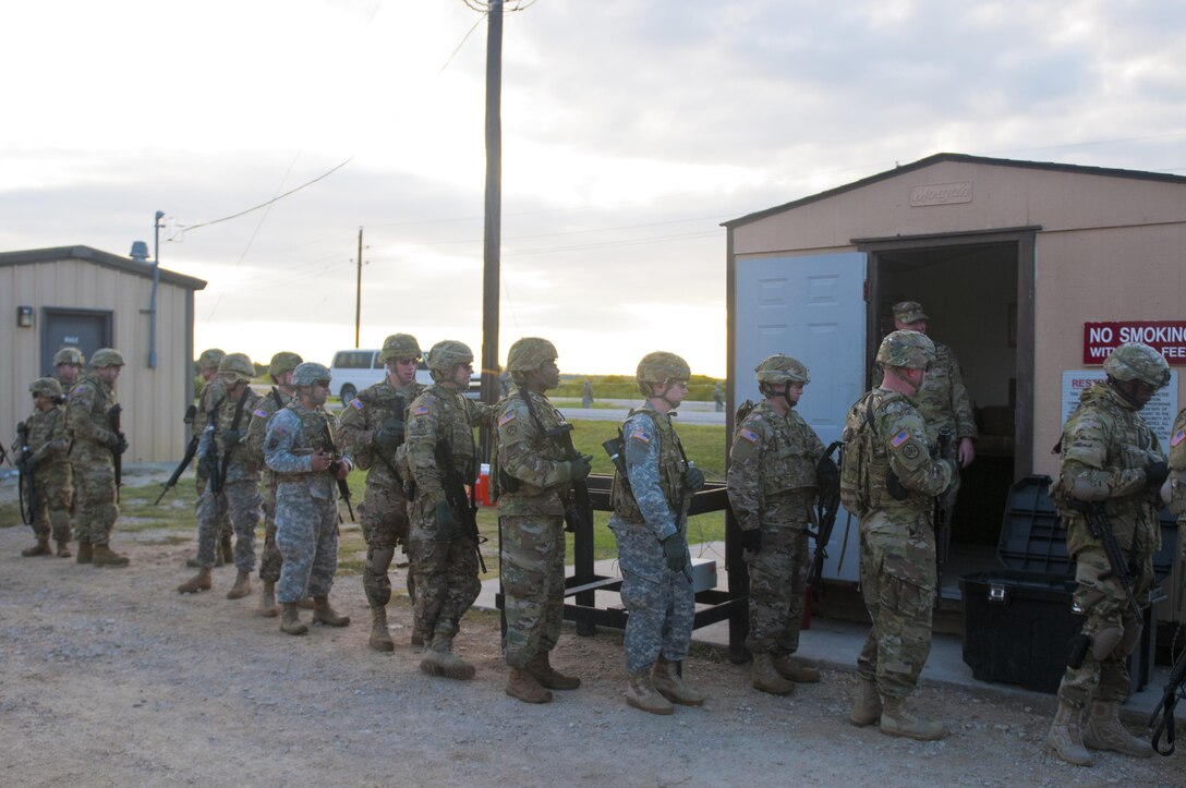 Soldiers with the 316th Sustainment Command (Expeditionary), based out of Coraopolis, Pa., receive ammunition to shoot their M4 carbines at Fort Hood, Tx., Oct. 9, 2016. This is to prepare the Soldiers of the 316th during their predeployment training. (U.S. Army photo by Staff Sgt. Dalton Smith / Released)