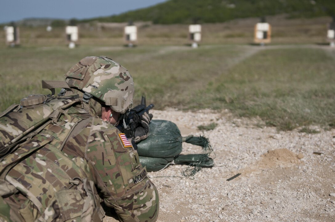 Warrant Officer Douglas Wickham, an Army Reserve Soldier with the 316th Sustainment Command (Expeditionary), based out of Coraopolis, Pa., shoots his M4 carbine during qualification at Fort Hood, Tx., Oct. 9, 2016. This is to prepare the Soldiers of the 316th during their predeployment training. (U.S. Army photo by Staff Sgt. Dalton Smith / Released)