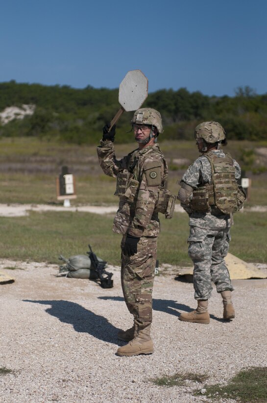 Sgt. Christopher Bigelow, a public affairs noncommissioned officer with the 316th Sustainment Command (Expeditionary), based out of Coraopolis, Pa., tells the tower the range is clear at Fort Hood, Tx., Oct. 9, 2016. (U.S. Army photo by Staff Sgt. Dalton Smith / Released)