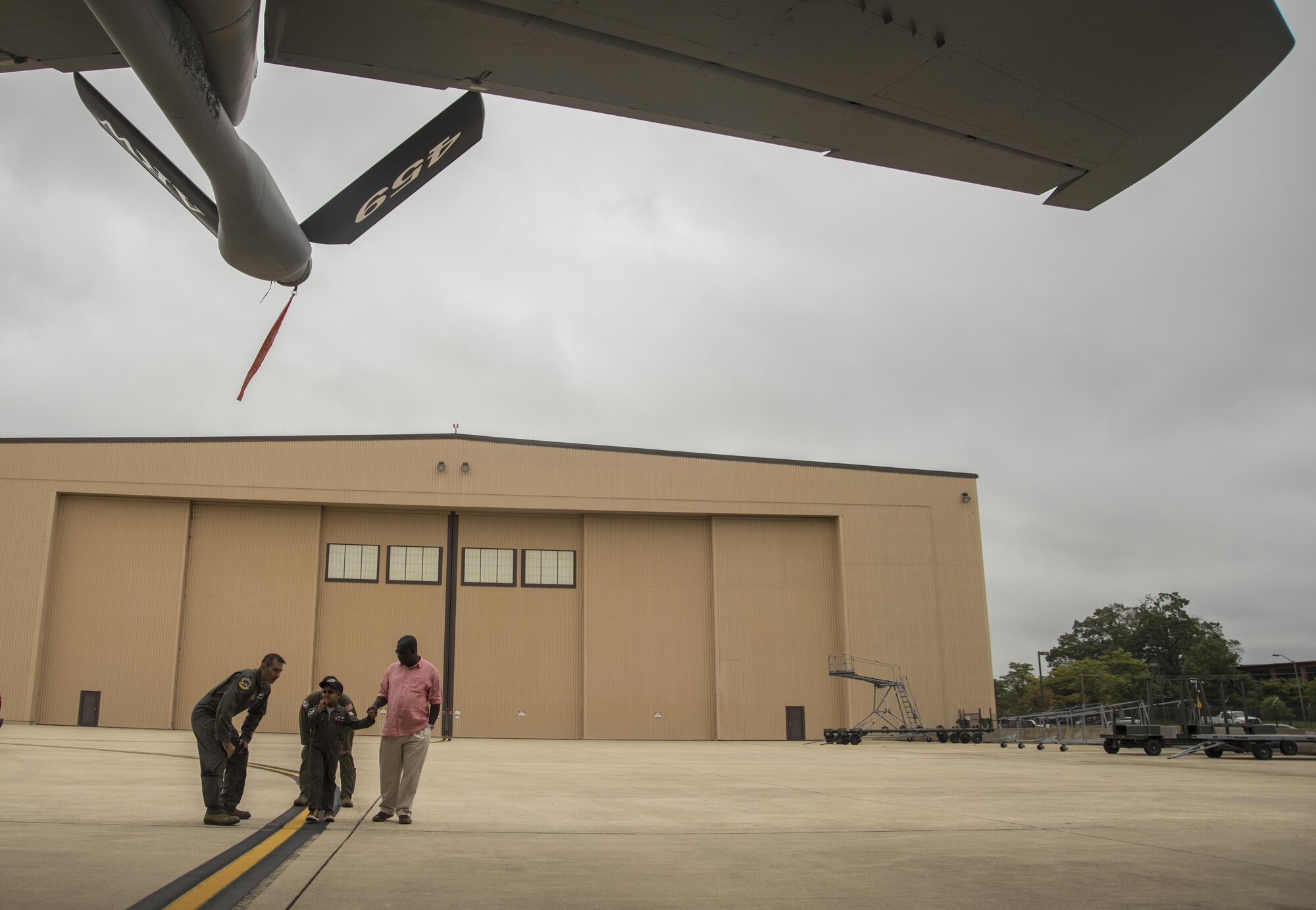 Kwami Penty flies in an UH-1 Iroquois simulator as part of the “Pilot for a Day” program at Joint Base Andrews, Md., Oct. 6, 2016. The event is held biannually for children battling serious illnesses. In addition to flying in simulators, Kwami spent the day participating in demonstrations and touring static aircraft displays. (U.S. Air Force photo by Senior Airman Jordyn Fetter)