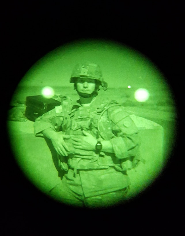 Cpt. Michael Webb, an Army Reserve Soldier with the 316th Sustainment Command (Expeditionary), based out of Coraopolis, Pa., poses after firing the M240B machine gun during a night qualification at Fort Hood, Tx., Oct. 10, 2016. This is to prepare the Soldiers of the 316th during their predeployment training. (U.S. Army photo by Staff Sgt. Dalton Smith)