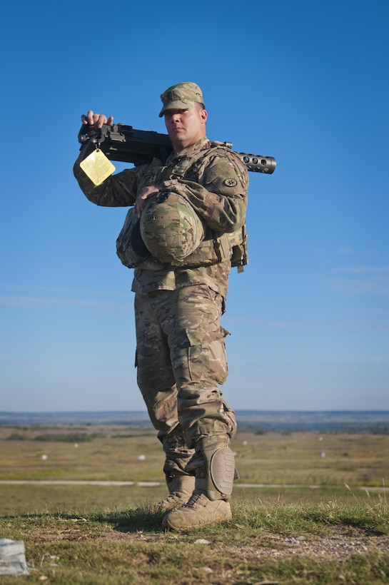 Sgt. 1st Class Casey Bargar, an Army Reserve Soldier with the 316th Sustainment Command (Expeditionary), based out of Coraopolis, Pa., prepares to mount the M2 machine gun to its tripod before qualification at Fort Hood, Tx., Oct. 10, 2016. This is to prepare the Soldiers of the 316th during their predeployment training. (U.S. Army photo by Staff Sgt. Dalton Smith)