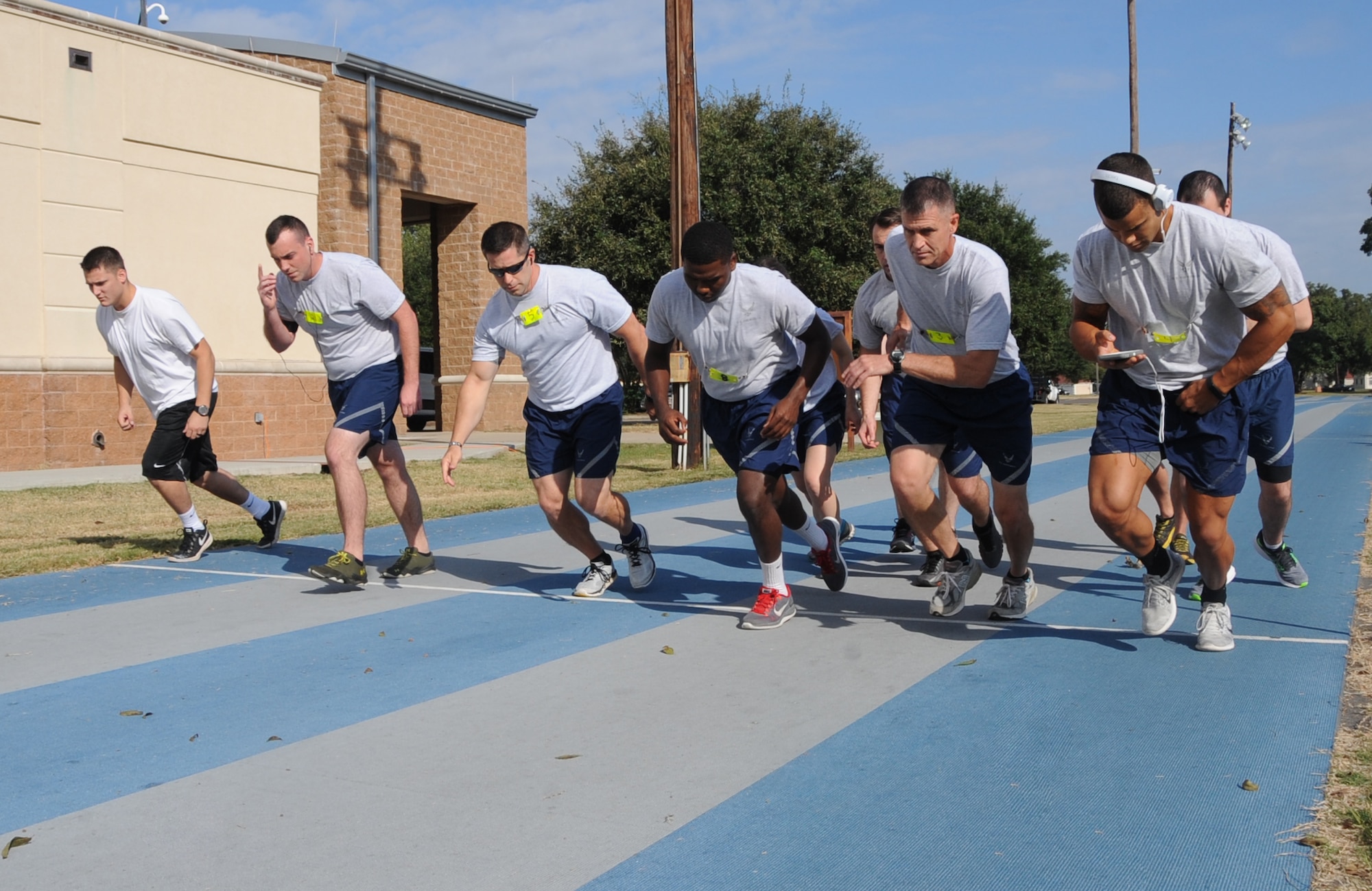 Airmen begin the 1.5-mile run during their fitness assessment at the Senior Airman Bryan R. Bell Fitness Center on Barksdale Air Force Base, La., Oct. 11, 2016.  The running component of the test is worth the most points out of the testable phases of the assessment. (U.S. Air Force photo/Airman Alexis C. Schultz)