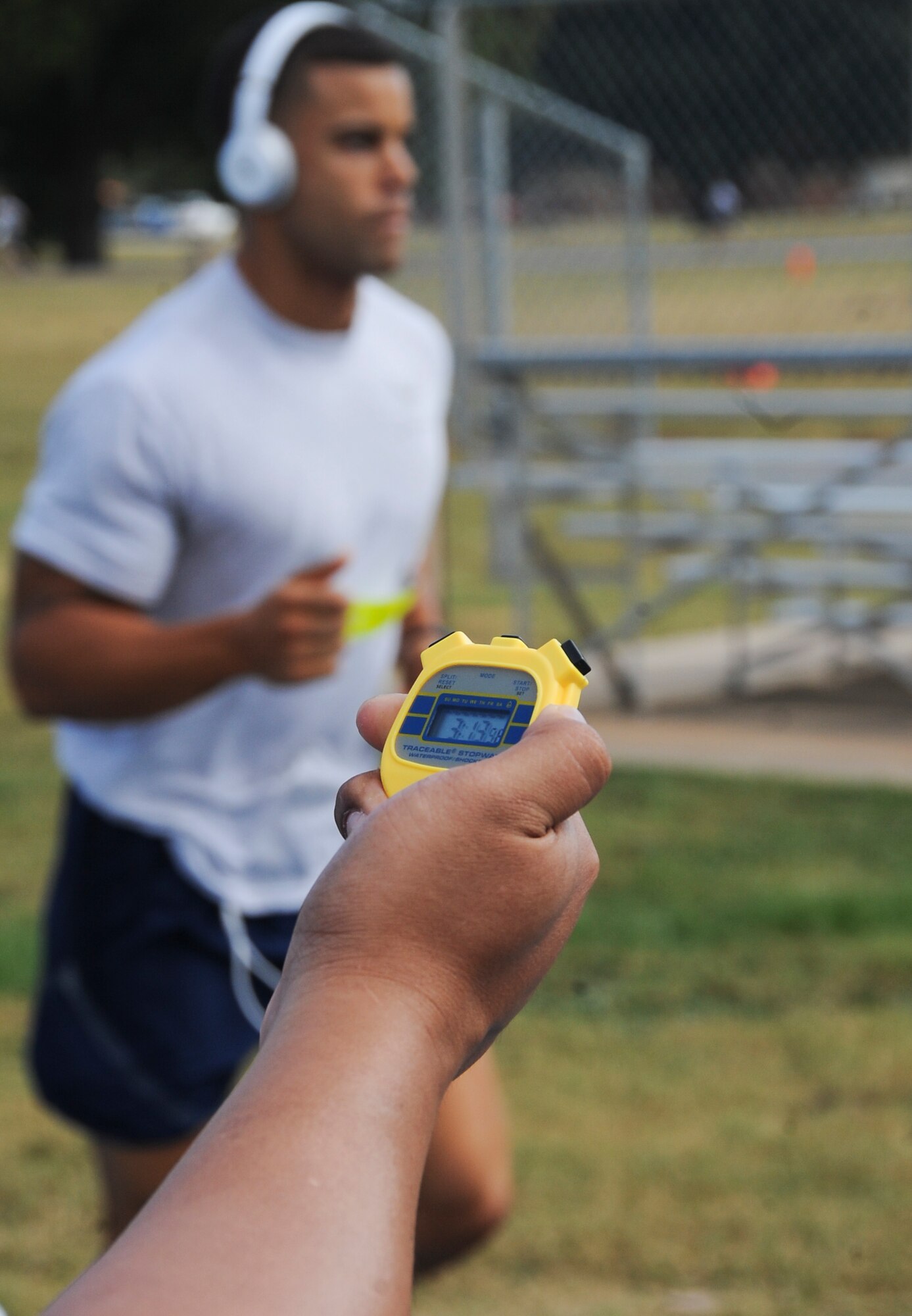 Fitness Assessment center member, augments the running portion of the fitness assessment at the Senior Airman Bryan R. Bell Fitness Center on Barksdale Air Force Base, La., Oct. 11, 2016. The Air Force requires an annual or semi-annual fitness assessment requiring a passing score in a 1.5-mile run, push-ups and sit-ups. (U.S. Air Force photo/Airman Alexis C. Schultz)