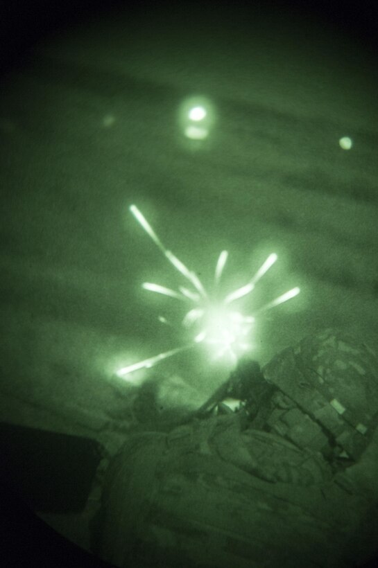 Spc. Ian Shaffer, an ammo stock control specialist with the 316th Sustainment Command (Expeditionary), an Army Reserve unit from Coraopolis, Pa., fires a M240B machine gun during a night qualification exercise as a part of the pre-deployment training 316th ESC Soldiers are receiving at Fort Hood, Tx., Oct. 10, 2016. (U.S. Army photo by Sgt. Christopher Bigelow)