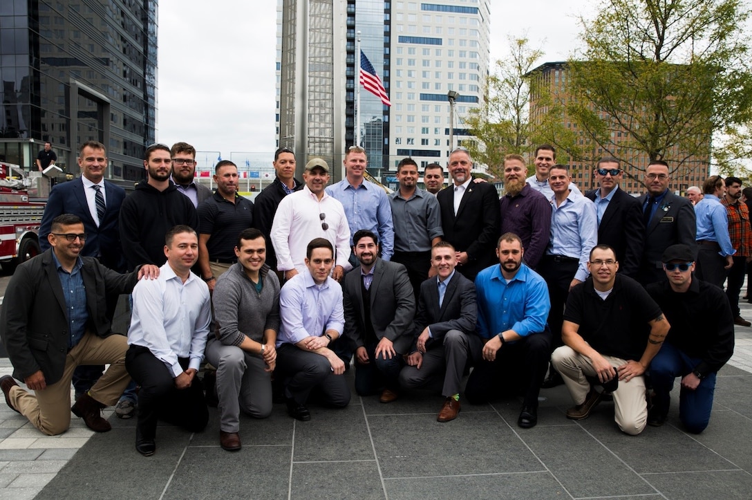 Marines and Sailors from 1st Battalion, 25th Marine Regiment, 4th Marine Division, gather at the Massachusetts Fallen Heroes Memorial during the unit’s 10-year reunion, here, Oct. 8, 2016. The service members gathered to reflect and recognize the accomplishments of their deployment to Fallujah, Iraq, as well as memorialize the lives of their fallen brothers. (U.S. Marine Corps photo by Cpl. Melissa Martens/ Released) 