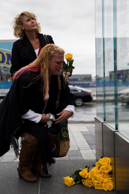 Gold Star families from 1st Battalion, 25th Marine Regiment, 4th Marine Division, lay gold roses at the Massachusetts Fallen Heroes Memorial during the unit’s 10-year reunion of its deployment to Fallujah, Iraq, here, Oct. 8, 2016. The Gold Star families gathered with the Marines and Sailors to share stories of their loved ones who died in service to the nation, and remember all they sacrificed for their country. (U.S. Marine Corps photo by Cpl. Melissa Martens/ Released)  