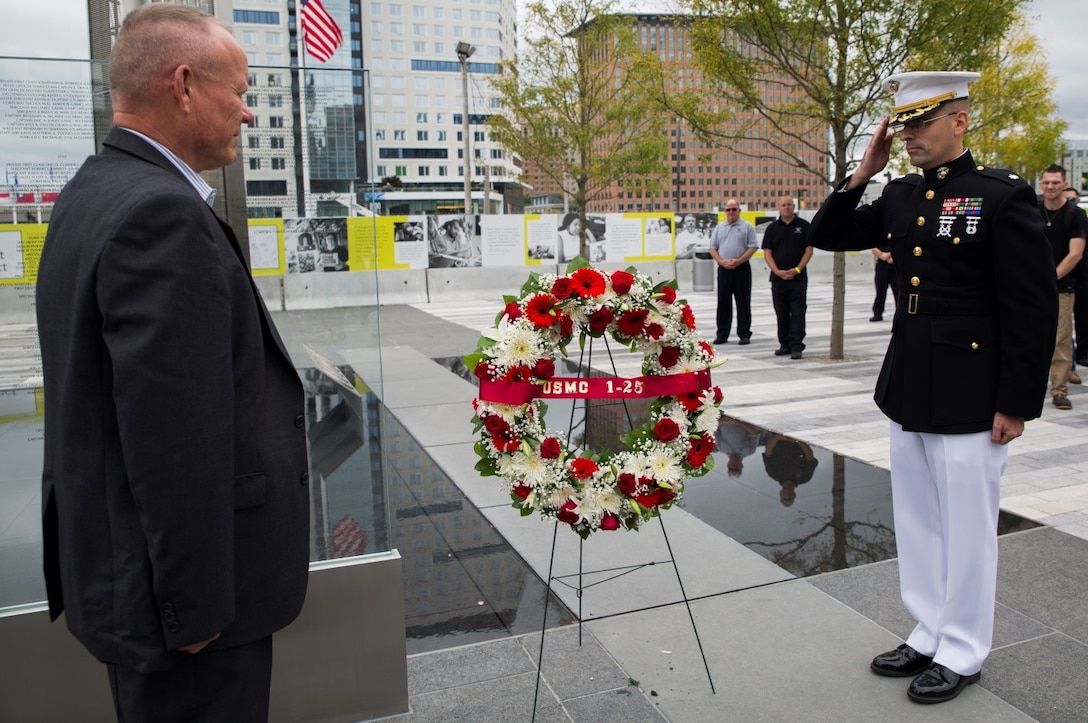 Lt. Gen. Lawrence D. Nicholson (left), commanding general of III Marine Expeditionary Force, and Lt. Col. Jason Borovies (right), Inspector-Instructor of 1st Battalion, 25th Marine Regiment, 4th Marine Division, place a wreath at the Massachusetts Fallen Heroes Memorial during 25th Marine Regiment’s 10-year reunion, here, Oct. 8, 2016. The wreath was laid to honor the 11 fallen service members who died during the units deployment to Fallujah, Iraq, in 2006. (U.S. Marine Corps photo by Cpl. Melissa Martens/ Released) 