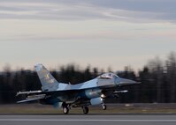 A U.S. Air Force F-16 Fighting Falcon assigned to the 18th Aggressor Squadron takes off from Eielson Air Force Base, Alaska, Oct. 10, 2016, for the first combat training mission of RED FLAG-Alaska (RF-A) 17-1. The average Aggressor pilot has at least 1,000 fighter hours and hundreds of hours of studying to become experts in enemy tactics used to train U.S. Air Force, joint and coalition partners during U.S. Pacific Air Forces commander-directed RF-A exercises. (U.S. Air Force photo by Master Sgt. Karen J. Tomasik)