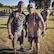 Tech. Sgt. Robert Hattan, right, and a teammate covered in mud after participating in a GORUCK event. 
