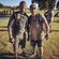 Tech. Sgt. Robert Hattan, right, and a teammate covered in mud after participating in a GORUCK event. 
