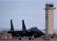 A Republic of Korea Air Force (ROKAF) F-15K Slam Eagle multi-role fighter aircraft taxis past the Eielson Air Force Base, Alaska, air traffic control tower Oct. 10, 2016, during RED FLAG-Alaska (RF-A) 17-1. RF-A is a series of Pacific Air Forces commander-directed field training exercises vital to maintaining peace and stability in the Indo-Asia-Pacific region, and providing U.S. units and partner nation forces like the ROKAF the opportunity to sharpen their combat skills and strengthen interoperability in a realistic threat environment inside the Joint Pacific Alaska Range Complex. (U.S. Air Force photo by Master Sgt. Karen J. Tomasik)