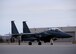 A U.S. maintenance Airman signals to a Republic of Korea Air Force F-15K Slam Eagle pilot and weapons officer as they return a salute while taxiing down the Eielson Air Force Base, Alaska, flight line Oct. 10, 2016, for the first mission of RED FLAG-Alaska (RF-A) 17-1. RF-A is a series of Pacific Air Forces commander-directed field training exercises that provide Airmen across the country and world opportunities to sharpen their combat skills and strengthen interoperability vital to maintaining peace and stability in the Indo-Asia-Pacific region. (U.S. Air Force photo by Master Sgt. Karen J. Tomasik)