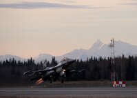 A U.S. Air Force F-16 Fighting Falcon assigned to the 18th Aggressor Squadron takes off from Eielson Air Force Base, Alaska, with afterburners engaged Oct. 10, 2016, for the first combat training mission of RED FLAG-Alaska (RF-A) 17-1. The average Aggressor pilot has at least 1,000 fighter hours and hundreds of hours of studying to become experts in enemy tactics used to train U.S. Air Force, joint and coalition partners during U.S. Pacific Air Forces commander-directed RF-A exercises. (U.S. Air Force photo by Master Sgt. Karen J. Tomasik)
