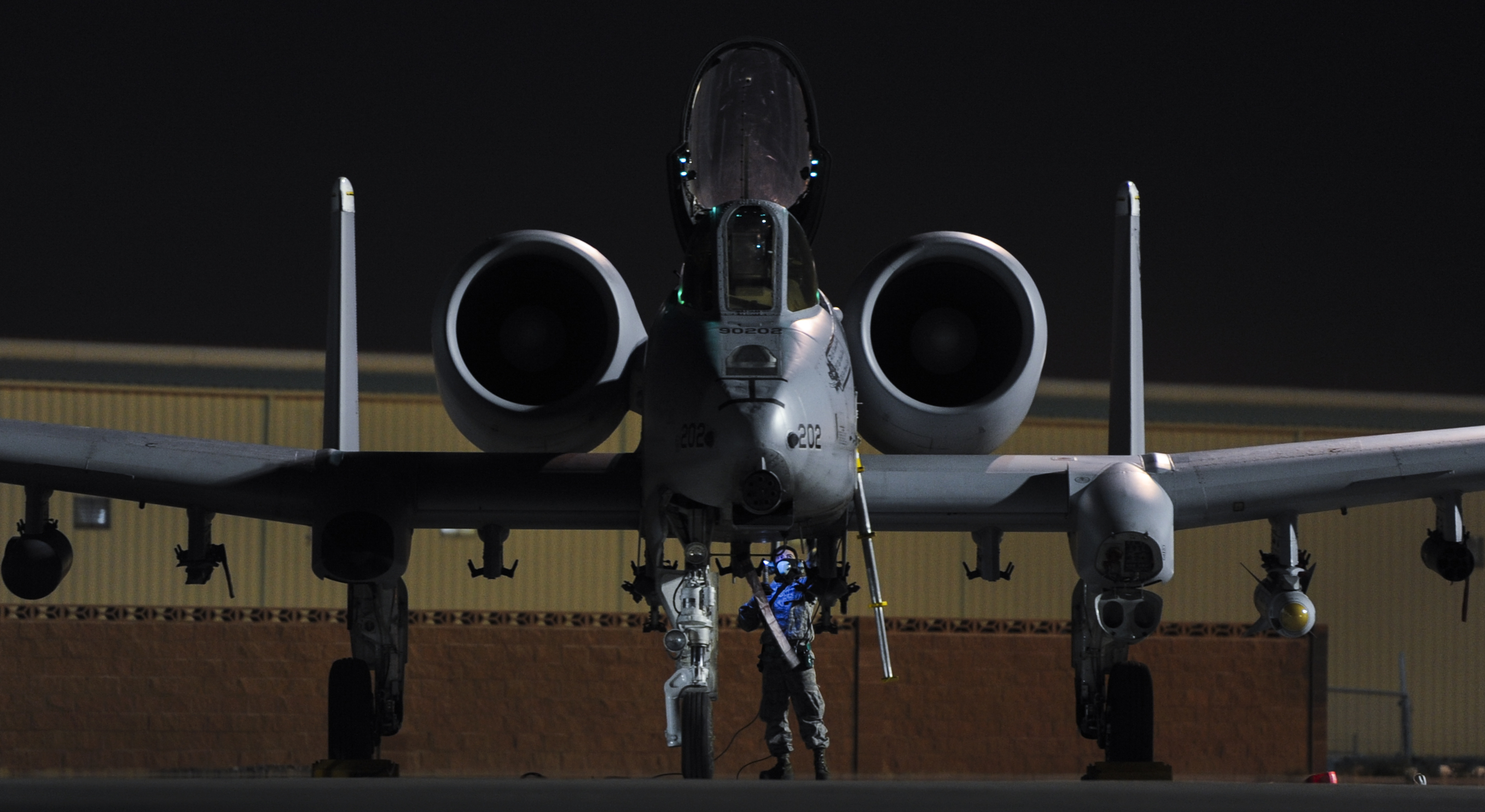 An Airman assigned to 355th Aircraft Maintenance Squadron, Davis-Monthan Air Force Base, Ariz., prepares an A-10 Thunderbolt II to participate in Green Flag 17-01 at Nellis Air Force Base, Nev., Oct. 4, 2016. During exercise execution, Green Flag staff direct, monitor and instruct visiting units in the conduct of air operations in support of ground forces. (U.S. Air Force photo by Airman 1st Class Kevin Tanenbaum/Released)