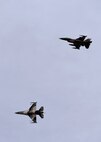 A pair of U.S. Air Force F-16 Fighting Falcons assigned to the 18th Aggressor Squadron fly over Eielson Air Force Base, Alaska, after returning from the Oct. 10, 2016, morning sortie during RED FLAG-Alaska (RF-A) 17-1. Aggressor pilots train U.S., joint and international partners during RF-A, a series of Pacific Air Forces commander-directed field training exercises, enabling units to sharpen their skills and strengthen interoperability by flying simulated combat sorties in a realistic threat environment inside the Joint Pacific Alaska Range Complex, the largest instrumented air, ground and electronic combat training range in the world. (U.S. Air Force photo by Master Sgt. Karen J. Tomasik)