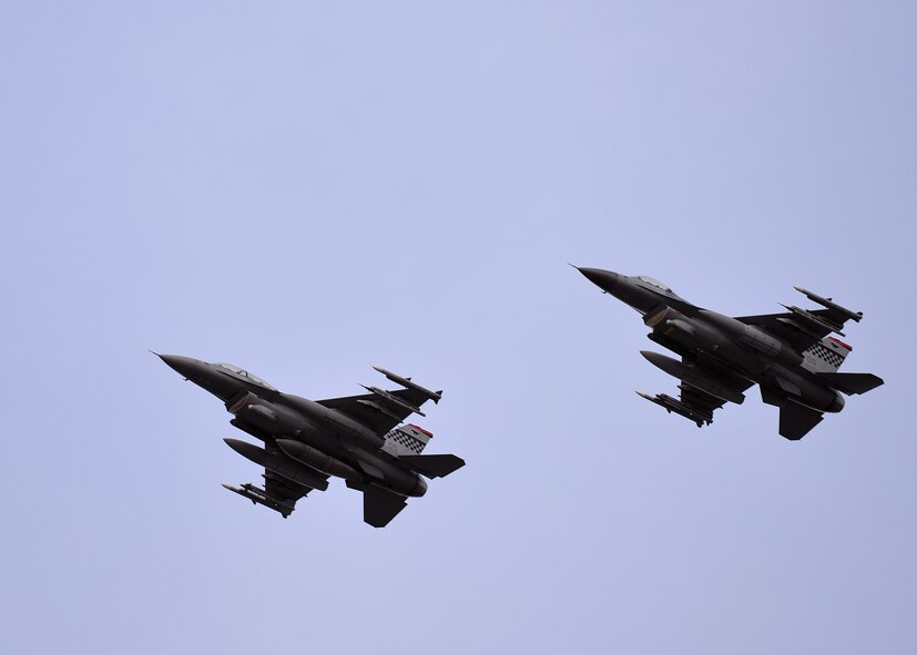 A pair of U.S. Air Force F-16 Fighting Falcons assigned to the 36th Fighter Squadron out of Osan Air Base, Republic of Korea, returns to Eielson Air Force Base, Alaska, Oct. 10, 2016, after the first RED FLAG-Alaska (RF-A) 17-1 combat training mission. RED FLAG training in Alaska signifies continued commitment to the Indo-Asia-Pacific region through a series of Pacific Air Forces commander-directed field training exercises for U.S. and partner nation forces, enabling joint and international units to sharpen their combat skills by flying simulated combat sorties in a realistic threat environment inside the Joint Pacific Alaska Range Complex. (U.S. Air Force photo by Master Sgt. Karen J. Tomasik)