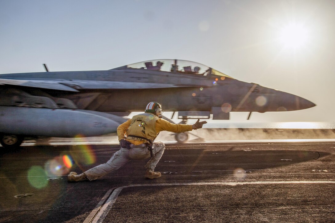 An F/A-18F Super Hornet launches from the USS Dwight D. Eisenhower in the Persian Gulf, Oct. 8, 2016. The aircraft carrier is supporting Operation Inherent Resolve, maritime security operations and theater security cooperation efforts in the U.S. 5th Fleet area of operations. Navy photo by Petty Officer 3rd Class Nathan. T Beard