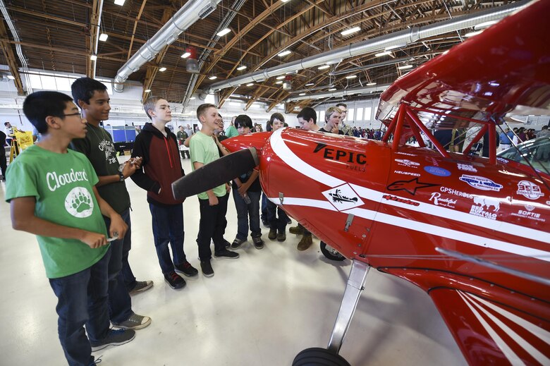 Children look at a static display of aircraft during the fourth annual New Mexico Aviation Aerospace Association Career Expo Oct. 6, 2016 at Holloman Air Force Base N.M. About 2,500 middle school through college-level students from across New Mexico came out to learn about the science, technology, engineering and mathematics fields. (U.S. Air Force photo by Staff Sgt. Stacy Jonsgaard)