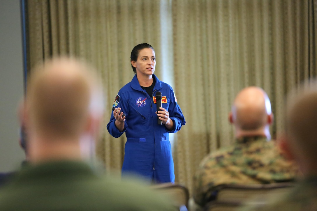 Lt. Col. Nicole “Duke” Mann hosts a seminar aboard Marine Corps Air Station Cherry Point, N.C., Oct. 11, 2016. The seminar was open to all Marines aboard the air station. Mann covered many topics including her background, the path she took to become an astronaut, what NASA is accomplishing currently and what the future holds for potential astronauts. “I’ve been to Cherry Point many times, but only when refueling,” said Mann. “It’s amazing to be back around Marines because NASA is a lot different from the Marine Corps. So it’s a breath of fresh air to hang out with some of the Marines here and talk to them about what it takes to become an astronaut.” Mann is currently the Marine Corps’ only active duty astronaut. (U.S. Marine Corps photo by Lance Cpl. Mackenzie Gibson/Released)