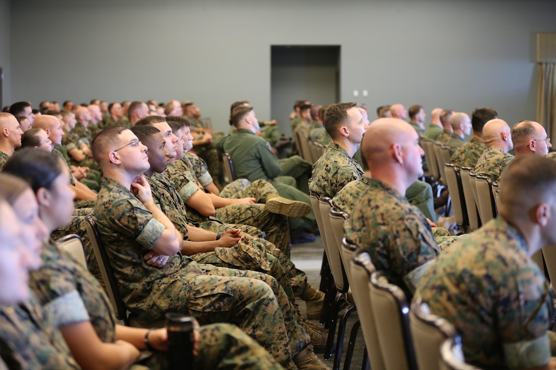 Marines from various units attend a seminar hosted by Lt. Col. Nicole “Duke” Mann aboard Marine Corps Air Station Cherry Point, N.C., Oct. 11, 2016. The seminar was open to all Marines aboard the air station. Mann covered many topics including her background story, the path she took to become an astronaut, what NASA is accomplishing currently and what the future holds for potential astronauts. “I’ve been to Cherry Point many times, but only when refueling,” said Mann. “It’s amazing to be back around Marines because NASA is a lot different from the Marine Corps. So it’s a breath of fresh air to hang out with some of the Marines here and talk to them about what it takes to become an astronaut.” Mann is currently the Marine Corps’ only active duty astronaut. (U.S. Marine Corps photo by Lance Cpl. Mackenzie Gibson/Released)