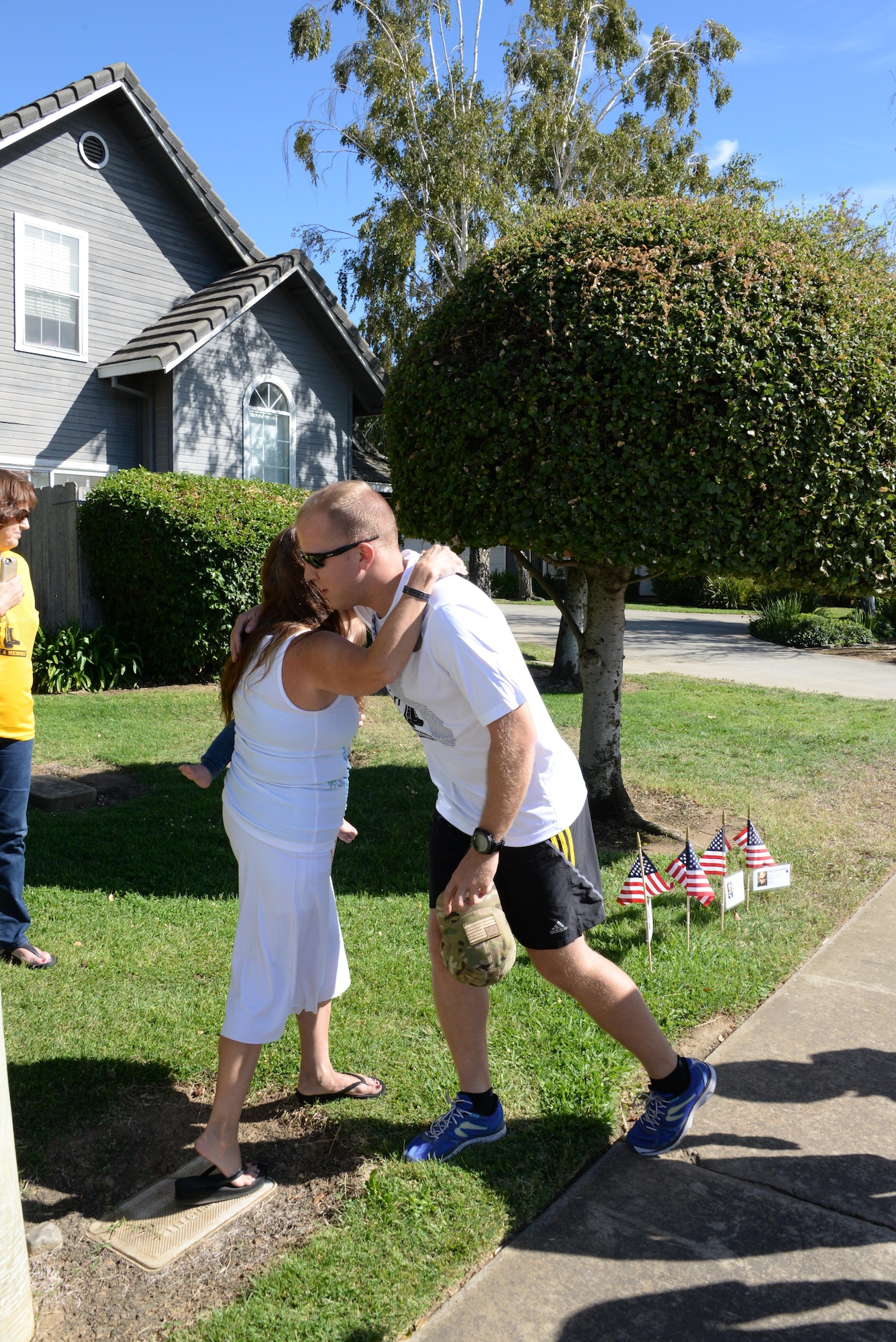 1st Lt Austin McCall, 60th Civil Engineering Squadron, hugs Donna Casillas, mother of Private 1st Class Justin Casillas, who was killed in action on July 4, 2009 in Afghanistan, during the California Run for the Fallen on Sept. 23, 2016. The run raises awareness for California service members who were killed in action after Sept. 11, 2001, rejuvenating their memories and keeping their spirits alive.  (U.S. Air Force photo by 2nd Lt Geneva Croxton