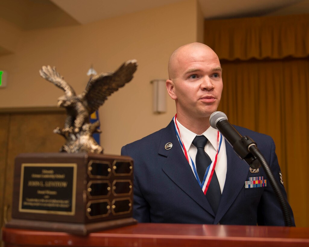 Senior Airman Brian Cozzie, 412th Maintenance Squadron, is Airman Leadership School Class 16-G’s John L. Levitow Award winner. The Levitow award is presented to the student that demonstrated the most outstanding leadership and scholastic qualities. Selection for the Levitow award is based on academic performance and assignment of points by peers and instructors. Class 16-G graduated Sept. 29 at Club Muroc. (U.S. Air Force photo by Joseph Gocong)