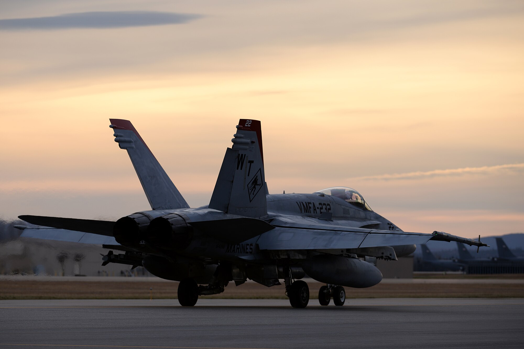 A pilot assigned to Marine Fighter Attack Squadron 232 out of Marine Corps Air Station Miramar, Calif., taxis his F/A-18C Hornet aircraft down the Eielson Air Force Base, Alaska, flight line as U.S. Air Force KC-135 Stratotanker aircraft wait in their ramp space in the background Oct. 10, 2016, during RED FLAG-Alaska (RF-A) 17-1. The Joint Pacific Alaska Range Complex provides more than 67,000 square miles of realistic training environment and allows commanders to train for full spectrum engagements, ranging from individual skills to complex, large-scale joint engagements. (U.S. Air Force photo by Master Sgt. Karen J. Tomasik)